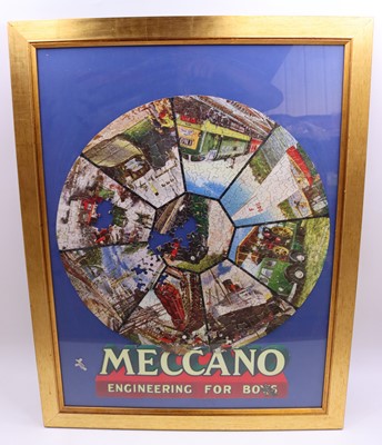Lot 2067 - Meccano Magazine framed round jigsaw,...