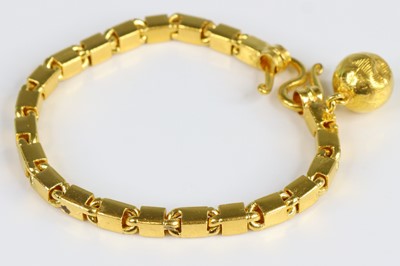 Lot 2700 - A middle eastern yellow metal rectangular link...