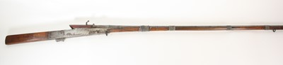 Lot 207 - A large 19th century Eastern matchlock rifle,...