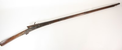 Lot 559 - A 19th century Eastern matchlock musket, the...