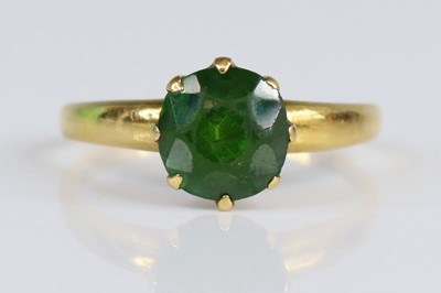 Lot 2711 - A 18ct gold solitaire ring, having a round...