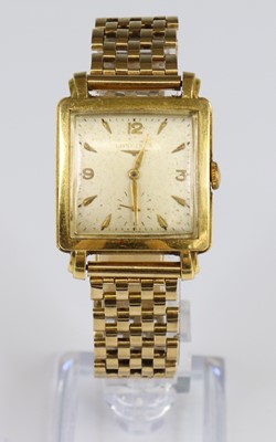 Lot 2712 - An 18ct gold Longines manual wind wristwatch,...