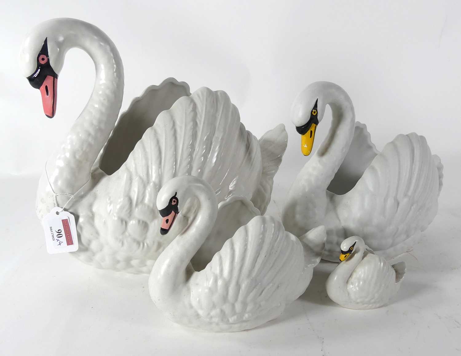 Lot 90 - A group of Dartmouth Devon swan figures, the...