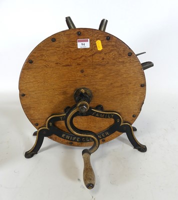 Lot 94 - A Victorian oak cased knife-sharpener, marked...