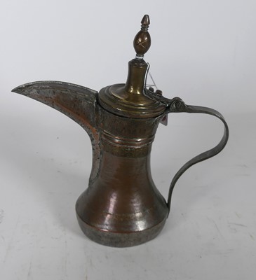 Lot 105 - A Middle-Eastern brass dallah