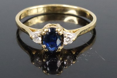 Lot 276 - A 9ct sapphire and diamond ring, the oval...