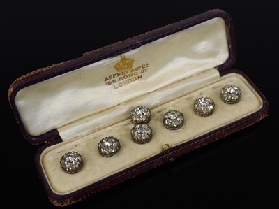 Lot 303 - A set of seven paste buttons, the round...