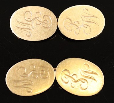 Lot 307 - A pair of 9ct gold oval monogrammed cuff links...