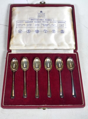 Lot 212 - A cased set of six silver coffee spoons in the...