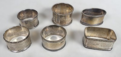Lot 217 - Six various silver napkin rings, generally...