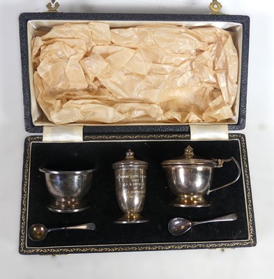 Lot 218 - A cased silver three-piece cruet set...