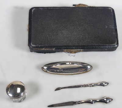 Lot 223 - An early 20th century silver mounted four...