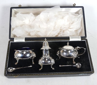 Lot 228 - A Georgian style silver three-piece cruet set,...