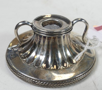 Lot 230 - An early 19th century silver dwarf candle...