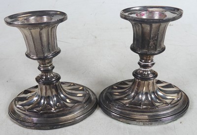 Lot 238 - A pair of Adam style silver dwarf candlesticks...