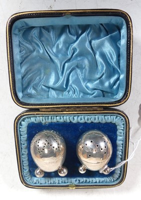 Lot 241 - An Edwardian silver two-piece cruet set as a...
