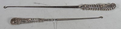 Lot 244 - A 19th century silver handled button hook of...