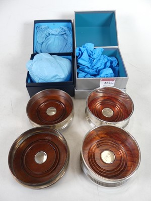 Lot 252 - A pair of modern silver coasters with turned...
