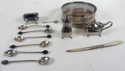 Lot 253 - A modern silver wine bottle coaster with...