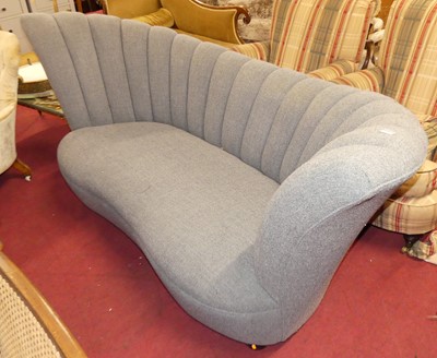 Lot 1285 - A contemporary fabric upholstered three-seater...