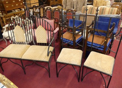 Lot 1295 - A Gothic style wrought iron slatback...