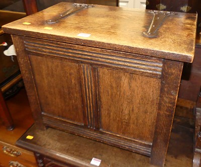 Lot 1304 - A joined oak and iron strapwork mounted...