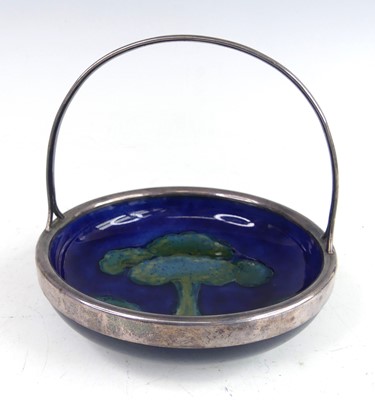 Lot 63 - An early 20th century Moorcroft 'Moonlit Blue'...