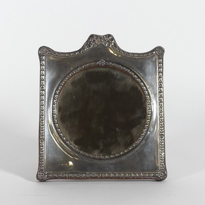 Lot 229 - An Edwardian silver clad easel mirror, of...