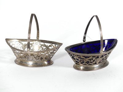 Lot 221 - A pair of Victorian silver sweetmeat baskets,...