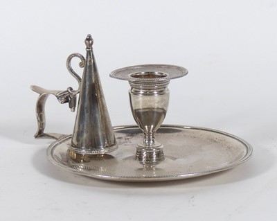 Lot 207 - A George III silver chamberstick, with candle...