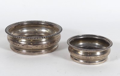 Lot 200 - An Edwardian silver wine coaster, having a...