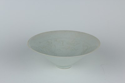 Lot 110 - A Chinese Qingbai bowl with carved foliage...