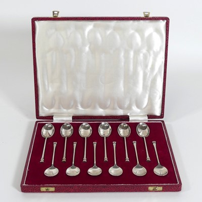Lot 237 - A set of twelve Elizabeth II silver tea and...