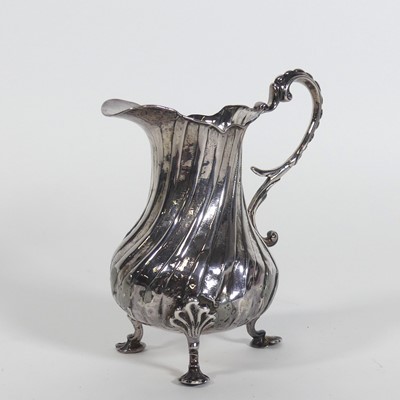 Lot 239 - An 18th century silver cream jug, of...