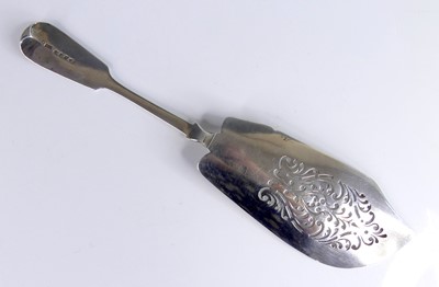 Lot 2085 - A William IV silver fish slice, in the Fiddle...