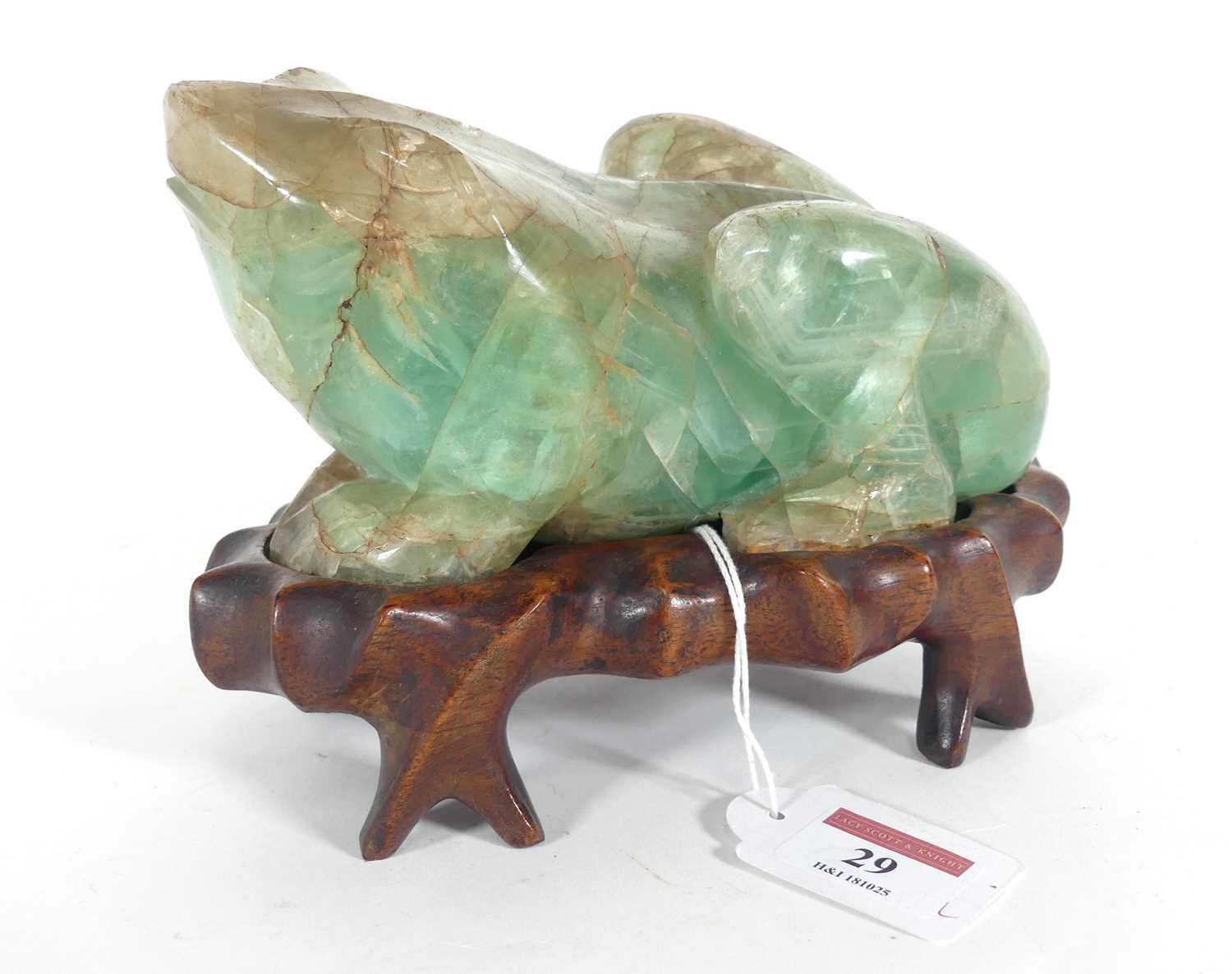 Lot 29 - A Chinese hardstone frog, 20th century, the...