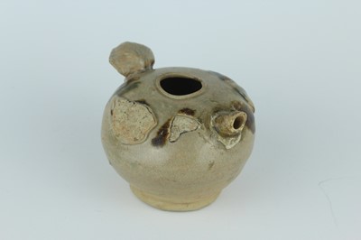 Lot 116 - Two Chinese Sancai-type wares and a celadon...