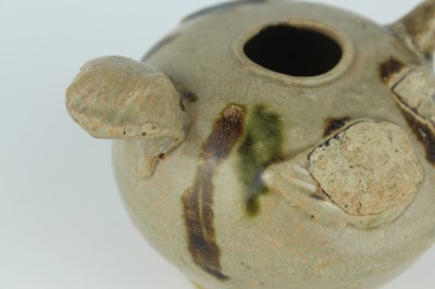 Lot 116 - Two Chinese Sancai-type wares and a celadon...
