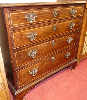 Lot 1145 - A George III mahogany and crossbanded chest of...