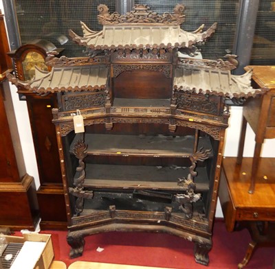 Lot 1172 - An early 20th century Japanese carved and...