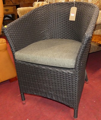 Lot 1353 - A contemporary rattan tub conservatory chair,...