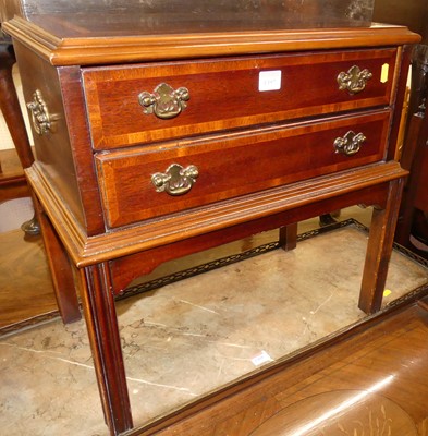 Lot 1397 - A contemporary mahogany low two drawer chest...