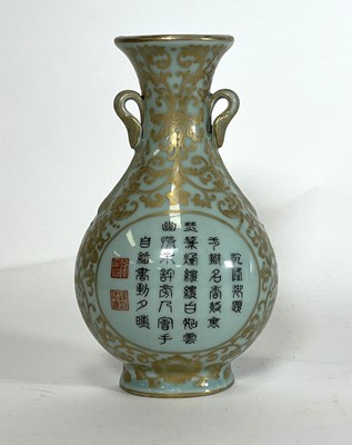 Lot 134 - A Chinese celadon glazed porcelain wall vase,...