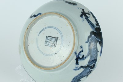 Lot 10 - A Chinese blue and white ‘dragon’ dish, Qing...