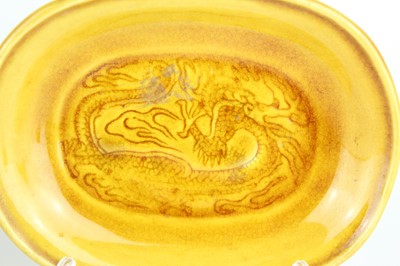 Lot 93 - Three Chinese yellow-glazed ‘dragon’ dishes,...