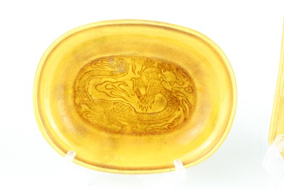 Lot 93 - Three Chinese yellow-glazed ‘dragon’ dishes,...