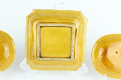 Lot 93 - Three Chinese yellow-glazed ‘dragon’ dishes,...