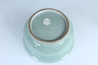 Lot 98 - A Chinese celadon censer and another tripod...