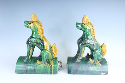 Lot 163 - A pair of Chinese sancai-glazed roof tile...
