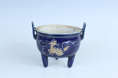 Lot 501 - A Chinese blue-glazed biscuit-relief decorated...